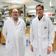 two Z-Station scientists stand in the lab