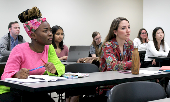 Master's program students in class