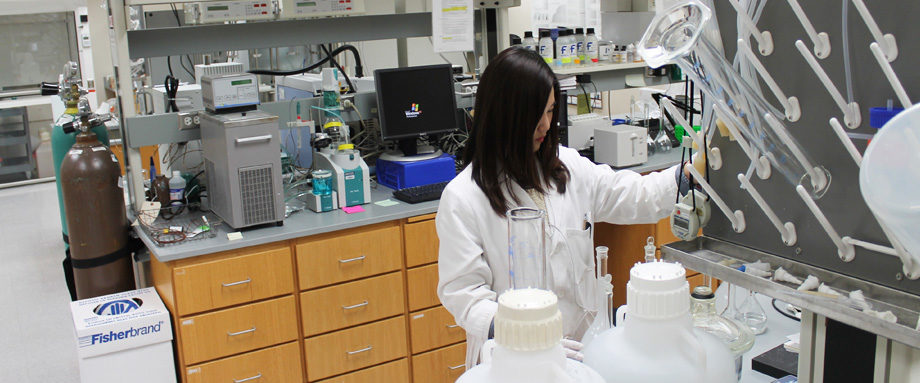 student working on equipment in z station lab